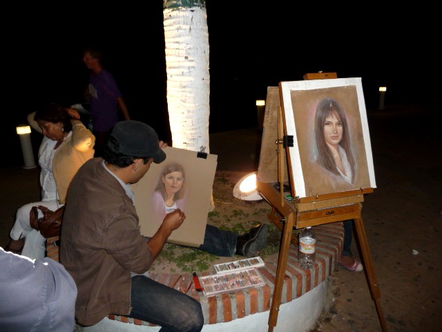 puerto vallarta mexico portrait artist at work